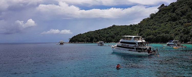 Yacht anchorage at the east coast of Racha Noi Island in Banana Bay