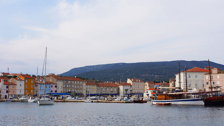 Yachts at the breakwater in Cres harbor