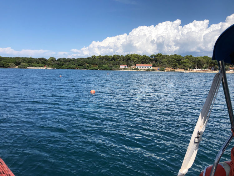 Yacht mooring at the buoys on the Mali Brijuni