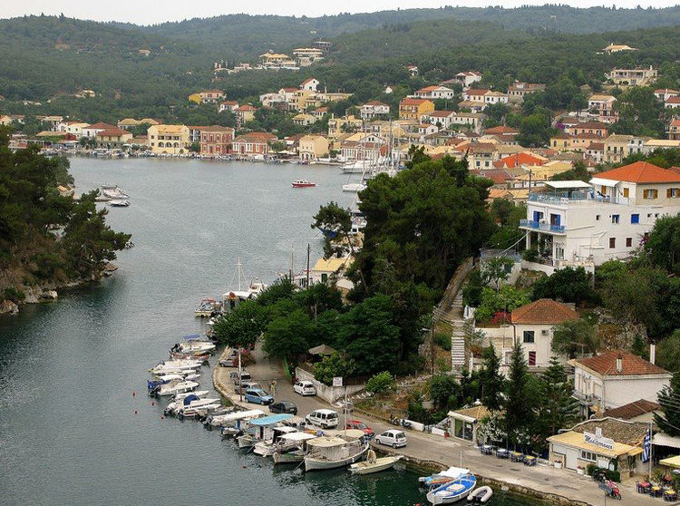 Yachts at the waterfront in Port Gaios. Paxos Island. Ionian Sea. Greece.