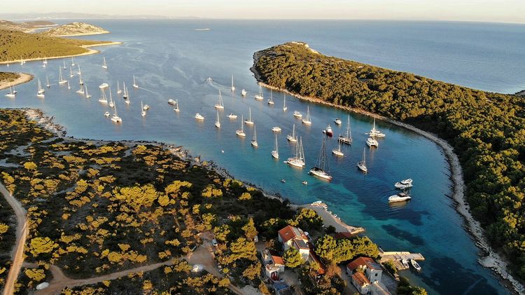 Yachts on mooring buoys in Stupica Vela Bay on Zirje Island