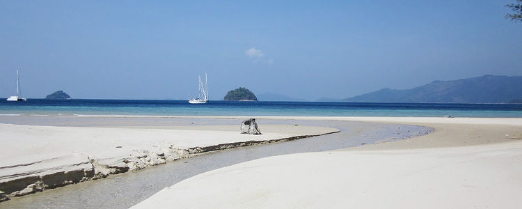 Yachts anchored off Adang Island in the Butang Archipelago. Andaman Sea, Thailand.