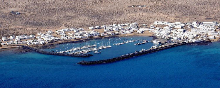 Yachts in the harbor of Caleta del Sebo on Graciosa Island