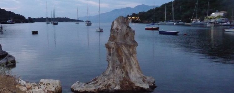 Yacht moorings in Ateni Bay on Meganisi Island. Ionian Sea. Greece.