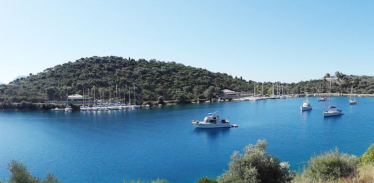 Anchorage of yachts in Ateni Bay on Meganisi Island.  Ionian Sea. Greece.