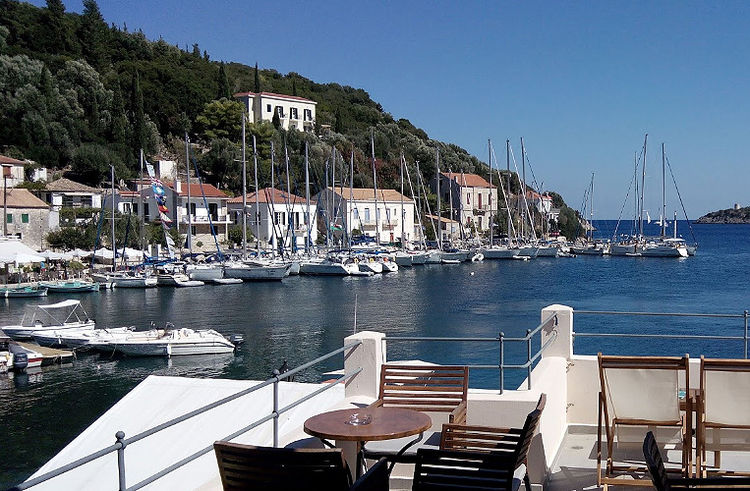 Yachts at the western waterfront in the port of Kioni