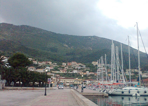 Yachts at the south-east pier in the port of Vathi. The island of Ithaki. Ionian Sea. Greece.