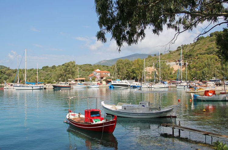 Yachts at the north-east pier in the port of Vathi. The island of Ithaki. Ionian Sea. Greece.