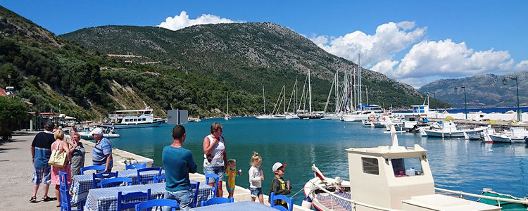 Yachts moorings in fishport Kalamos