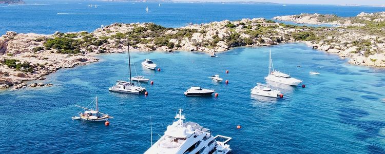 Yacht on buoys in Cala Francese