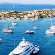 Yacht mooring on buoys in Cala Francese Bay