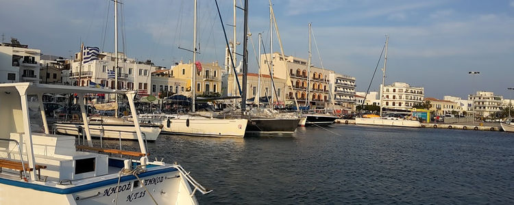 Yacht mooring in the Tinos Harbor