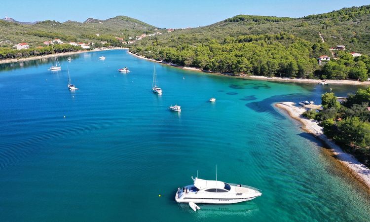 Yacht mooring at buoys in Mala Lamjana Bay