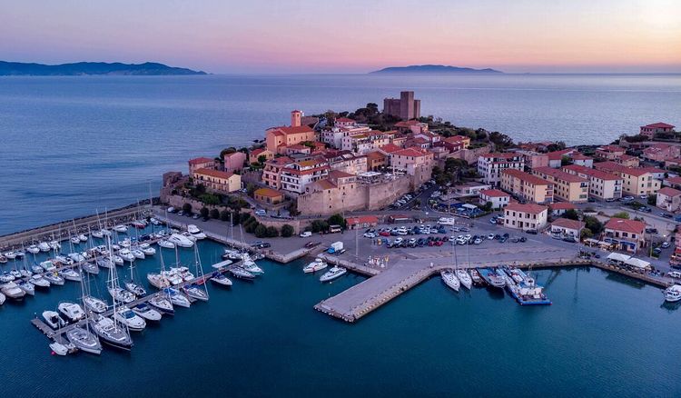 Yacht mooring in Talamone harbor