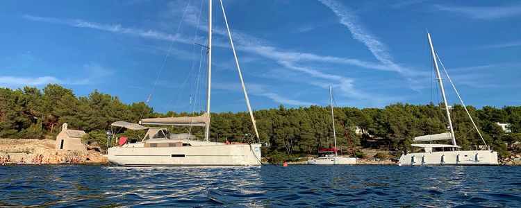 Yacht mooring at the buoys in Osibova Bay