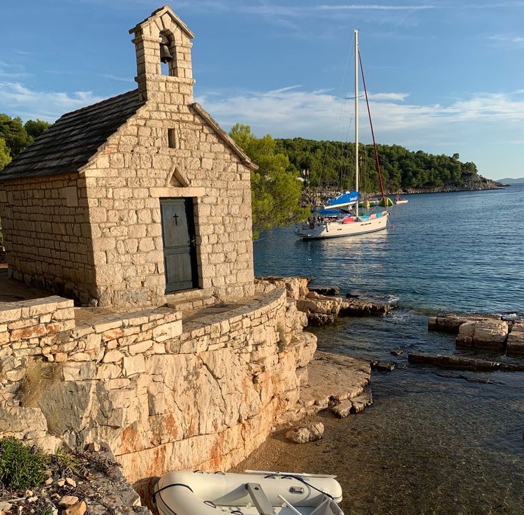 Yacht mooring at the buoys in Osibova Bay