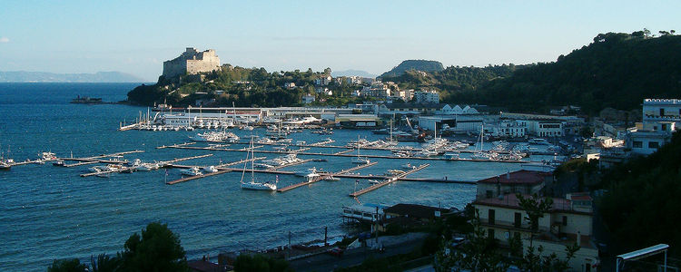 Yacht moorings in Baia harbor