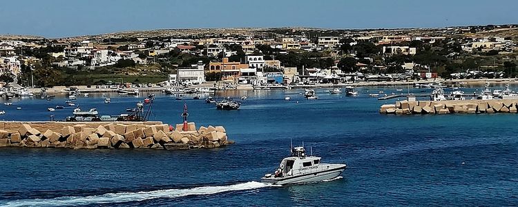 Yacht mooring in Lampedusa harbor