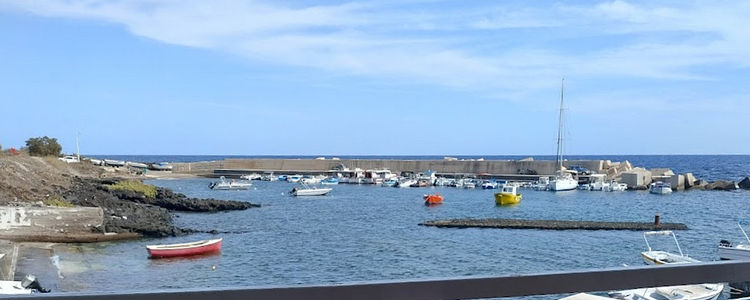 Yacht mooring in Port of Linosa