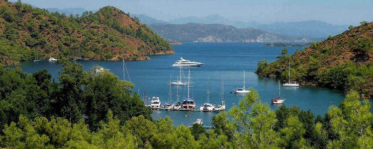 Yachts at the pier in Boynuz Buku Bay