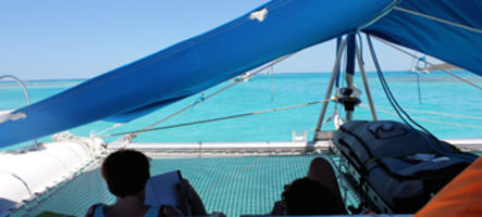 Lounging on the trampolines under the awning