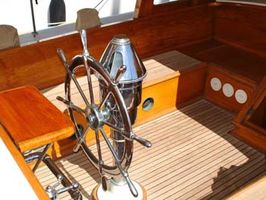 A portable table is set up in the cockpit for outside dining