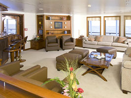 The bar and lounge on main deck is a popular place with guests