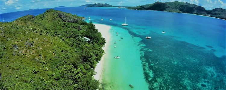 Anchorage of yachts in St. Jose Bay at the island of Curieuse