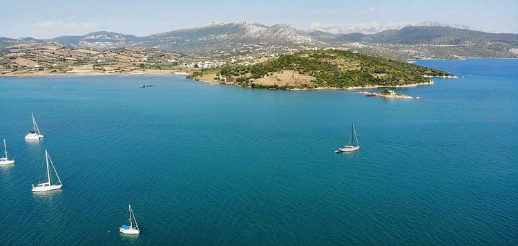 Yachts at anchor near Lygia Fishport