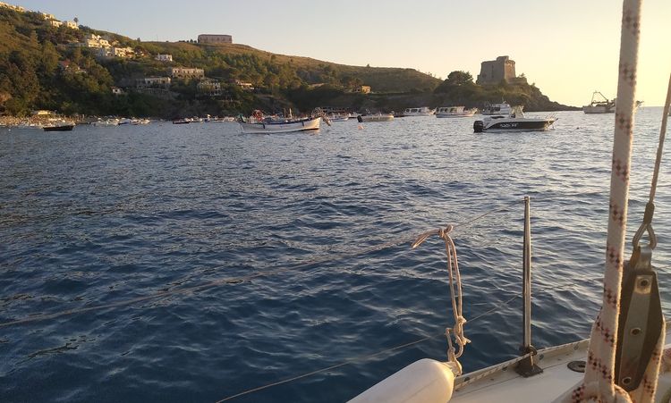 Yacht mooring on buoys in San Nicola Arcella Bay