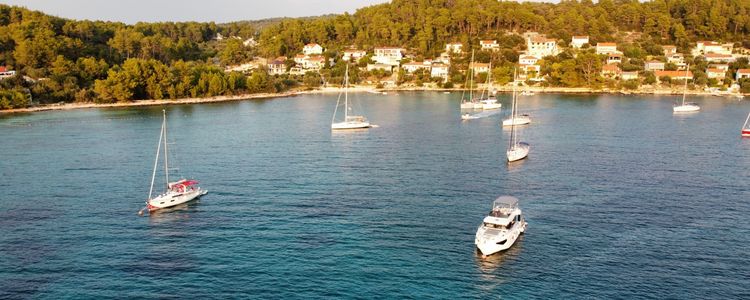 Yacht mooring at buoys in Gradina Bay