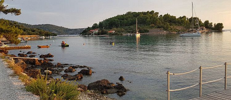 Yacht mooring at buoys in Gradina Bay