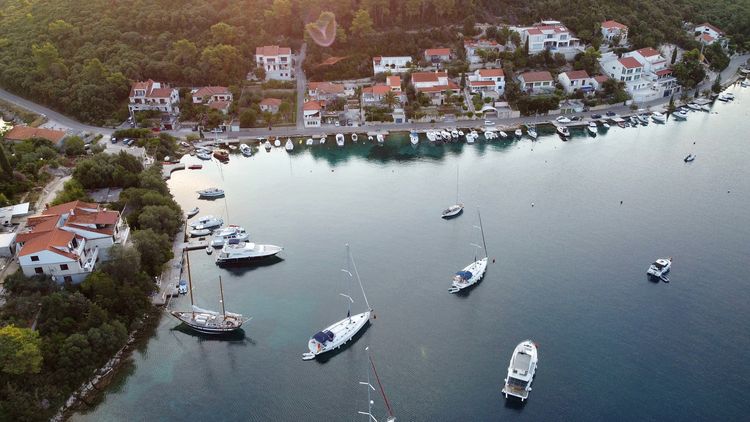 Yacht mooring on the buoys in Luka Banya Bay