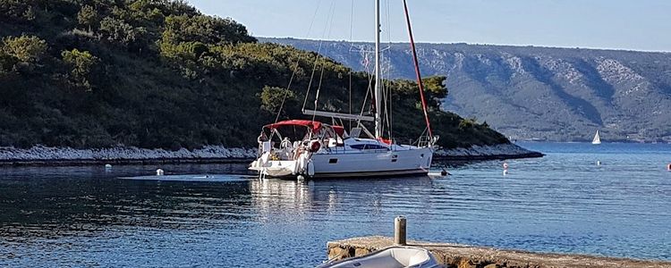 Yacht mooring at the buoys in Manastir Bay