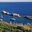 Yacht mooring on buoys in Velo Zarace Bay