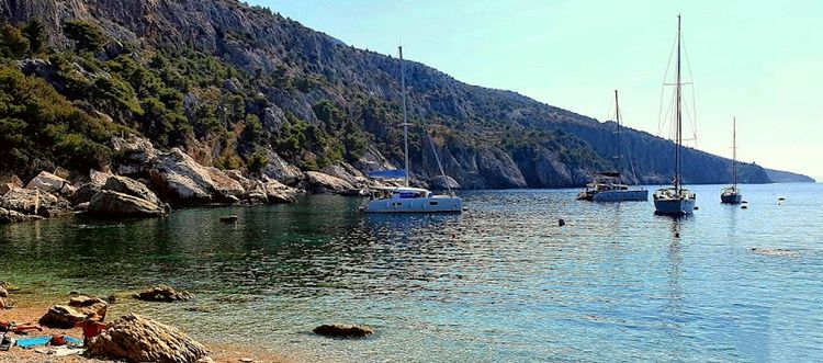 Yacht mooring on buoys in Velo Zarace Bay