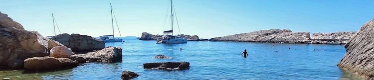 Yacht mooring on buoys in Velo Zarace Bay