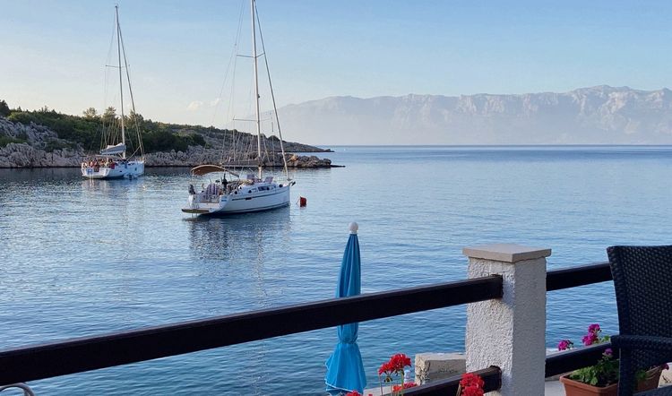 Yacht mooring at the buoys at the Yakov's Pension