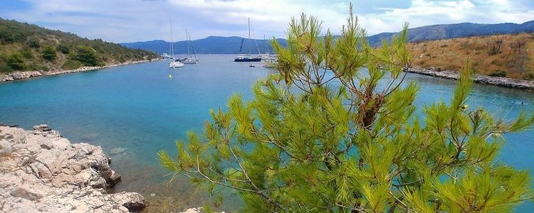 Yacht mooring at the buoys in Stupisca Bay