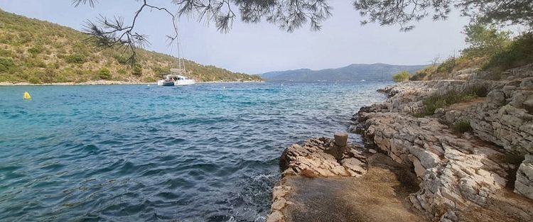 Yacht mooring at the buoys in Stupisca Bay