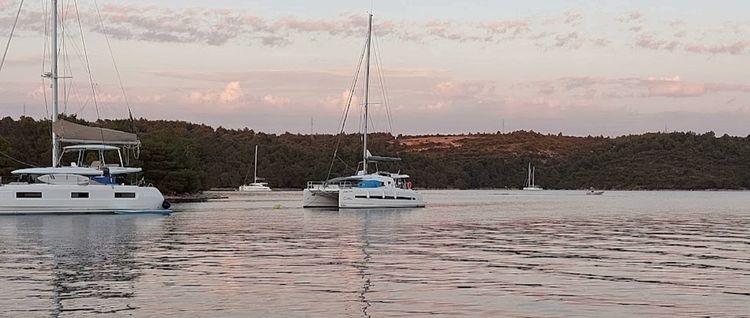 Yacht mooring on the buoys in Tihe Bay