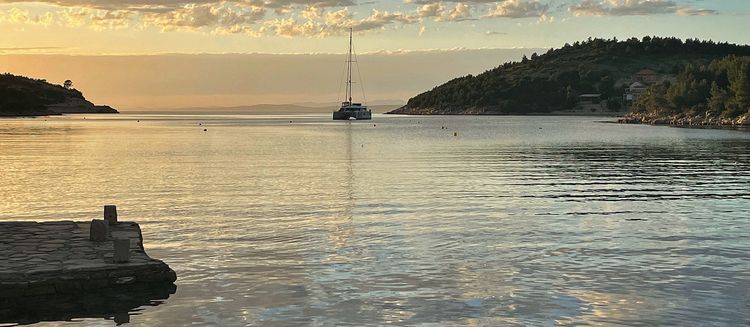 Yacht mooring on the buoys in Pribinja Bay