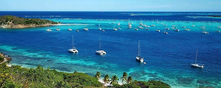 Yachts on buoys and anchors off Fregat Island