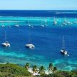 Yachts mooring at buoys and anchors off Fregate Island