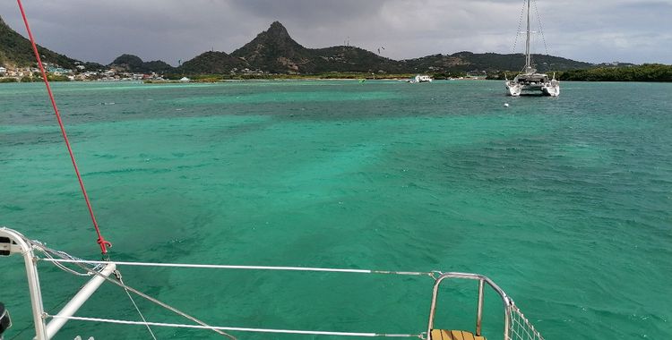 Yachts on buoys and anchors off Fregat Island