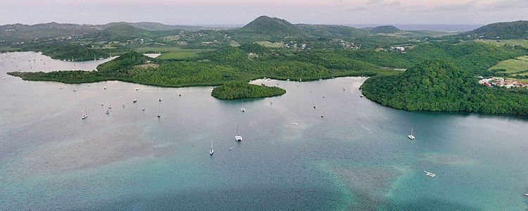 Yachts at the anchorage in Ilet Baude