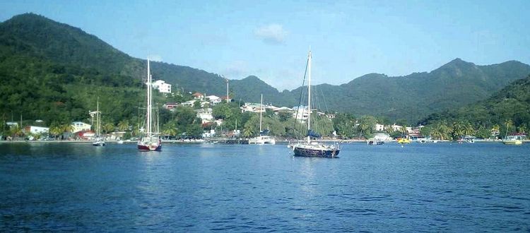 Yachts on anchors and buoys in Grande Arlets Bay