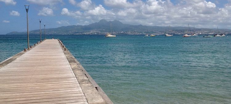 Yacht mooring at anchors and buoys in Alan Bay