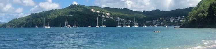 Yacht mooring at anchors and buoys in Alan Bay