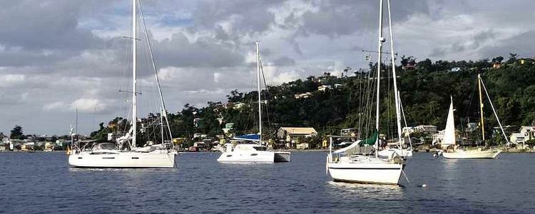 Yachts mooring at the buoys on Roseau roadstead